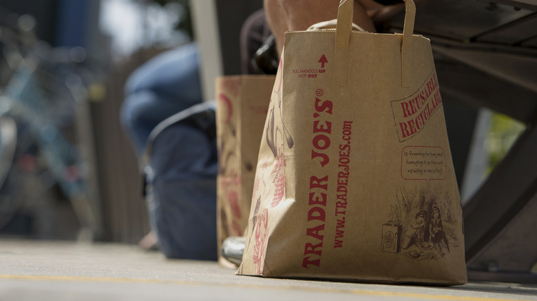 Trader Joe's bag on ground.