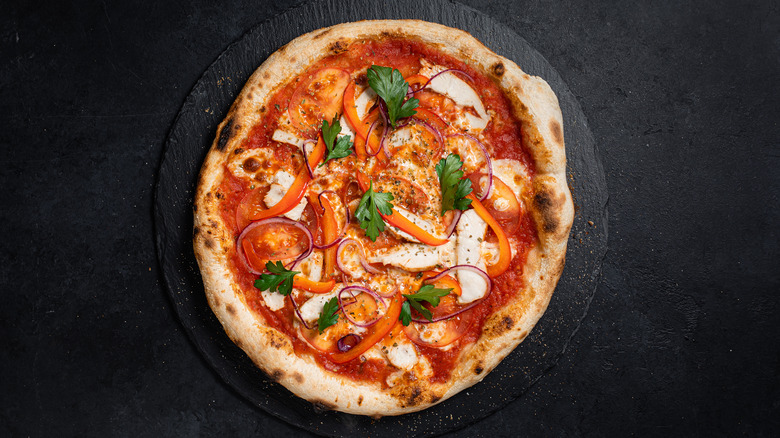 Neapolitan pizza on black background